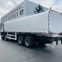 Camion d'arrosage diesel Euro 2 à bas prix, nouveau modèle Howo 6x4, 10 roues, capacité de 15000-20000 litres (3000 gallons)