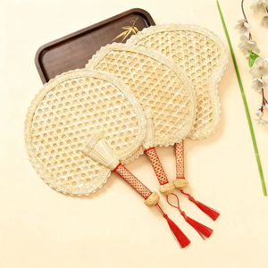 Handmade Woven Palm Leaf Fan Circular Cattail Material With Red Tassel For Home Decoration Summer Cooling - Product Image 1