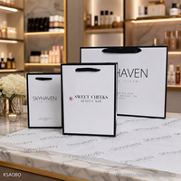 Sac en papier personnalisé avec logo pour vêtements, sac de shopping blanc de luxe avec poignée en ruban pour boutique, vente en gros