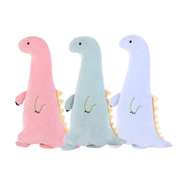 Vente en gros OEM ODM Jouet en peluche de dinosaure à dessin animé Poupée en peluche avec oreiller et animal