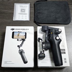 <span class=keywords><strong>DJI</strong></span> <span class=keywords><strong>Osmo</strong></span> Mobile 8 ของแท้ แบตเตอรี่ใช้งานได้นาน 10 ชั่วโมง ชาร์จโทรศัพท์มือถือได้ ระบบกันสั่น 3 แกน ให้การเพิ่มประสิทธิภาพความเสถียรที่แข็งแกร่ง - Product Image 1