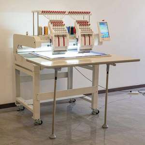 Б/у двухголовочная плосковязальная вышивальная машина Dahao Pro для пошива одежды, компьютеризированная - Product Image 1