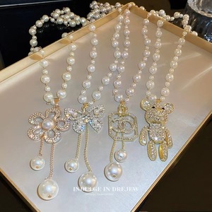 Fabricante al por mayor collar femenino <span class=keywords><strong>de</strong></span> alta gama versátil suéter <span class=keywords><strong>de</strong></span> <span class=keywords><strong>perlas</strong></span> largas simples con accesorio <span class=keywords><strong>de</strong></span> cadena <span class=keywords><strong>de</strong></span> eslabones <span class=keywords><strong>de</strong></span> aleación - Product Image 4
