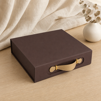 Boîte en papier gris magnétique pliable de style fin haut de gamme avec poignée en PU et logo estampé à chaud pour l'emballage de coffrets de soins de la peau, emballage plat