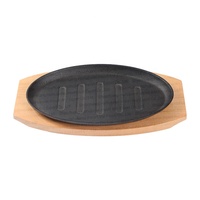 Fabrication de plaques de cuisson et de gril en fonte pré-assaisonnée de petite taille Plaque métallique grésillante