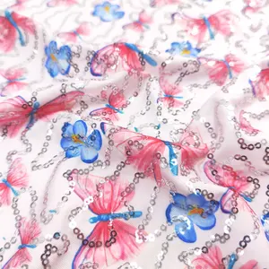 Atacado promocional OEM baixo preço desenhos personalizados DTY bordado tecido de lantejoulas para roupas infantis