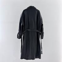Manteau long en cuir de mouton importé pour femme, style trench, double boutonnage, avec ceinture à la taille et multiples poches, pour un look décontracté urbain