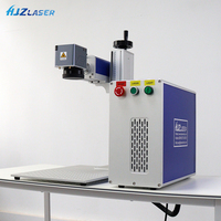 Machine laser à fibre divisée 30W durable à faible consommation pour plaques signalétiques en laiton, accessoires automobiles et gravure de caractères permanents
