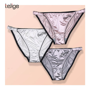 Braguitas de bikini triangulares de punto sólido con volantes de lujo de alta calidad, de seda helada, lisas, de talle bajo, sin costuras, transpirables <span class=keywords><strong>y</strong></span> elegantes para mujer. - Product Image 1
