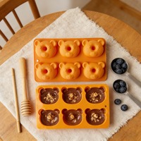 Assortiment de moules en silicone antiadhésifs pour la pâtisserie, comprenant des formes d'ours, d'étoile, de cœur, de beignets, de chocolat, de biscuits et de pâtisseries carrées