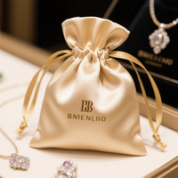 Sac à bijoux en soie de luxe et pochette en satin pour l'emballage avec fermeture en soie et doublure de haute qualité pour les magasins de marque