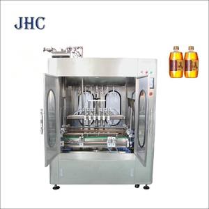 Machine de remplissage automatique d'huile comestible PLC haute précision pour huile de cuisson, huile de palme, huile rouge, boissons, bouteilles en plastique et en verre - Product Image 1