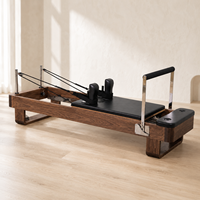 Machine de Pilates professionnelle en bois d'érable canadien, équipement de Pilates en bois d'érable, couleur et logo personnalisés en cuir pour les distributeurs mondiaux