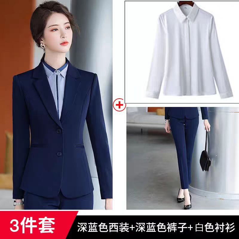 Dark blue suit, white shirt and trousers