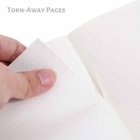 Carnet d'exercices de format A5, reliure cousue à plat, avec coutures apparentes sur le dos, pour l'école