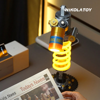 Lampe de bureau créative de style amortisseur de voiture, finition métallique imprimée en 3D, modèle décoratif de bureau en plastique, boîte en carton