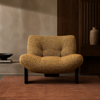 Fauteuil de loisirs minimaliste italien en bouclette avec rembourrage en mousse de canard, design artisanal écologique, idéal pour salle à manger de villa