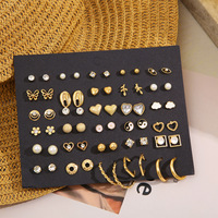 À la mode perle papillon et marguerite Tai Chi mode boucles d'oreilles luxe plaqué or Zircon pierres pour les femmes âgées doux Cool en gros