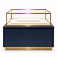 Vitrine de présentation de bijoux bleu marine personnalisée avec cadre doré pour magasin de bijoux en gros