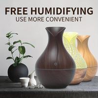Diffuseur d'huiles essentielles portable mini 200 ml, humidificateur à grain de bois avec 9 couleurs d'éclairage d'ambiance nocturne