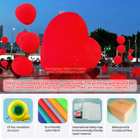 Ballon en tissu Oxford rouge géant en forme de cœur Publicité commerciale Gonflable pour la décoration de fête Esthétique commerciale Expositions artistiques