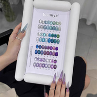 Ensemble de vernis à ongles en gel durable Tuomiya 32 couleurs Monet bleu-violet effet œil de chat, emballage de base, kit professionnel pour salons de manucure