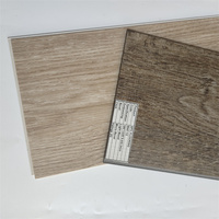 Revêtement de sol en plastique SPC de luxe, épaisseur 4 mm 5 mm, carrelage de sol en vinyle plastique imperméable SPC pour la décoration de la maison