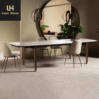 Fabrication sur mesure de table à manger longue moderne avec plateau en marbre et pieds en acier inoxydable