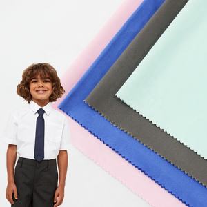 Tela textil fabricante proveedor al por mayor sólido teñido tejido liso TC poliéster algodón niños estudiantes uniformes escolares tela - Product Image 1