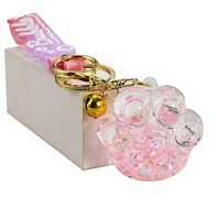 Porte-clés patte de chat lumineux en acrylique créatif infusé d'huile, breloque de sac exquise, style mignon, cadeaux en gros de Chine