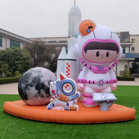Ensemble gonflable sur le thème de l'espace personnalisé, personnage gonflable géant d'astronaute de dessin animé avec boule lunaire et modèle de fusée
