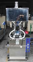 Machine semi-automatique de remplissage de mélangeur thermique de vaseline de bougie de cire machine d'embouteillage de chauffage de mélange de gelée de pétrole