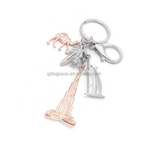 Venta al por mayor Dubai recuerdo llavero chapado en <span class=keywords><strong>oro</strong></span> llaveros Burj Dubai torre <span class=keywords><strong>de</strong></span> Palm colgante encanto clave <span class=keywords><strong>de</strong></span> <span class=keywords><strong>la</strong></span> cadena - Product Image 1