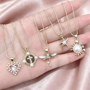 สร้อยคอทองชุบ 18K ดีไซน์สวยงาม ประดับมุก รูปหัวใจ ไม้กางเขน แมลงปอ ปลาดาว สำหรับผู้หญิง เครื่องประดับแฟชั่น ขายส่ง - Product Image 3
