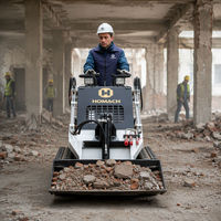 Chargeuse sur pneus compacte de 950 kg pour la démolition et la manutention de matériaux