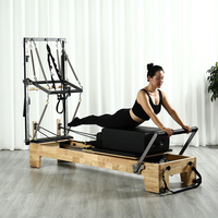 Vente en gros usine : Reformer Pilates de luxe en bois avec demi-tourneuse, machine de yoga professionnelle multifonctionnelle pour studio, 145 kg