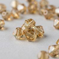 Großhandel Leichte Colorado Topas Kristall Bicone Strass 4mm Facettierte Aufnäh-Glasperlen für Kleidung Stickerei Schmuck DIY