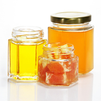 Pot et bouteille de miel avec impression de logo personnalisé emballage en carton cadeau boîte hexagonale de luxe emballage pour le miel