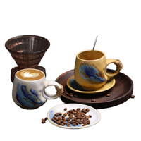 Ensemble de tasses à café et soucoupes en céramique rétro modernes tournées au four pour le thé de l'après-midi et les fêtes Tasse à latte de petite capacité