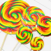 Lecca-lecca arcobaleno di caramelle dure di forma rotonda Giant Fruit Flavor Swirl