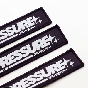 Llavero con Logotipo y Eslogan Personalizados para Eventos Culturales Juveniles y Comunidades de Estilos de Vida Alternativos, Jet Tags - Product Image 2