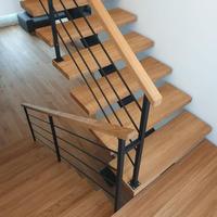 Escalier monopoutre architectural pour projet de luxe avec fabrication de précision et concept d'escalier ouvert