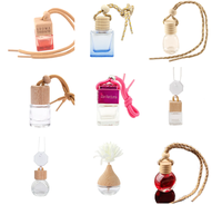 Bouteille en verre de parfum de parfum de sens de sortie de ventilateur automobile de 10ml avec le chapeau en bois et la bouteille de diffuseur de voiture d'agrafe d'évent en métal