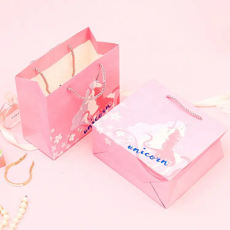 Impression de sacs à provisions promotionnels en papier rose avec votre propre logo et poignée