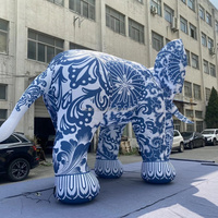 Modèle d'animal gonflable géant réaliste et accrocheur, éléphant gonflable de style traditionnel chinois avec motif floral pour les événements