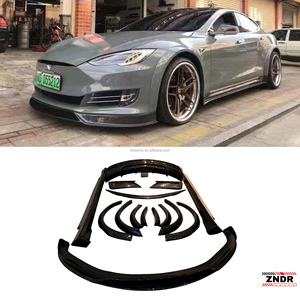 ชุดแต่งกันชนคาร์บอนไฟเบอร์แบบเปียกสำหรับรถเทสล่า โมเดล เอส ปี 2017 รุ่นไวด์บอดี้ พร้อมช่องสำหรับไฟตัดหมอก สปอยเลอร์หน้า/หลัง สเกิร์ตข้าง แบบติดตั้งด้วยสลักเกลียว - Product Image 1