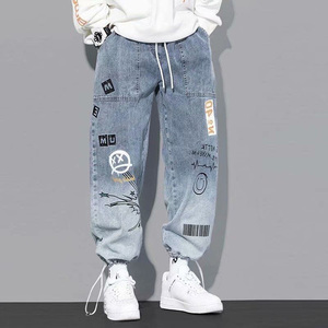 Frühling Herbst Saison Brief gedruckt Jeans Herren lose Cartoon Graffiti Leggings Hosen Trendy Draw string Denim Jeans - Product Image 4