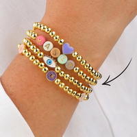 Bracelets extensibles personnalisés avec perles initiales, perles dorées, breloques œil porte-bonheur et pendentif cœur émaillé – Cadeaux d'anniversaire pour elle