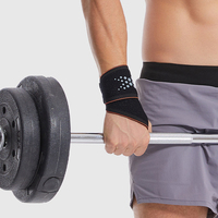 Attelle de poignet Power Grip avec sangle intégrale et doublure orange pour le soutien du poignet lors de l'entraînement de force