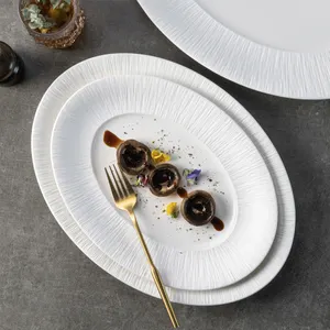 YAYU Factory Wholesale Catering Fancy Matted White Embossed Restaurant Serving Oval Fish Barbecue Dish Hotel Ceramic Plate